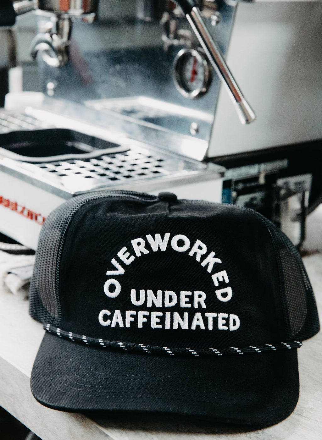 Overworked Under Caffeinated Hat